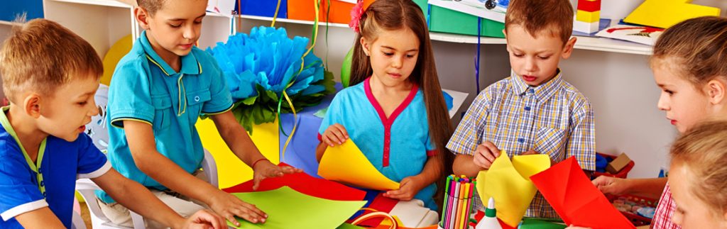 Some children are seen making a project - Wimbledon house nursery